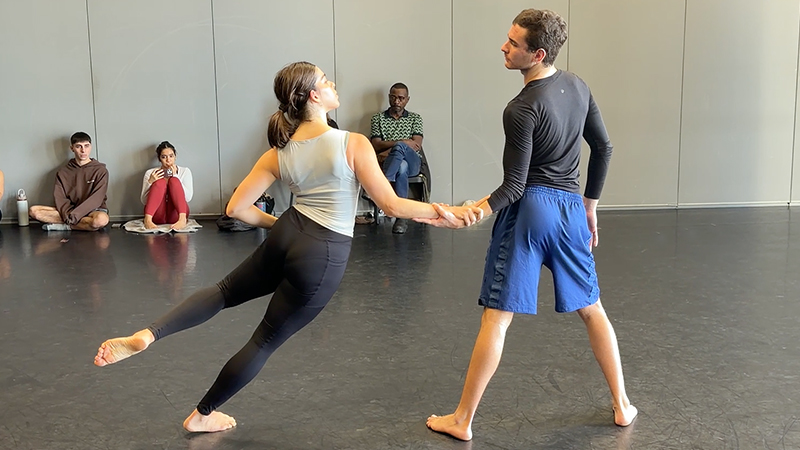Dance college students performing